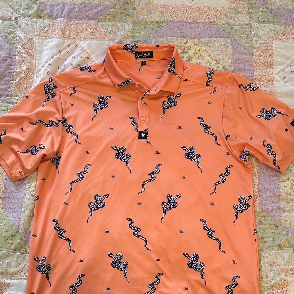 Bad Birdie Men's Polo in Vibrant Orange with Snake Design